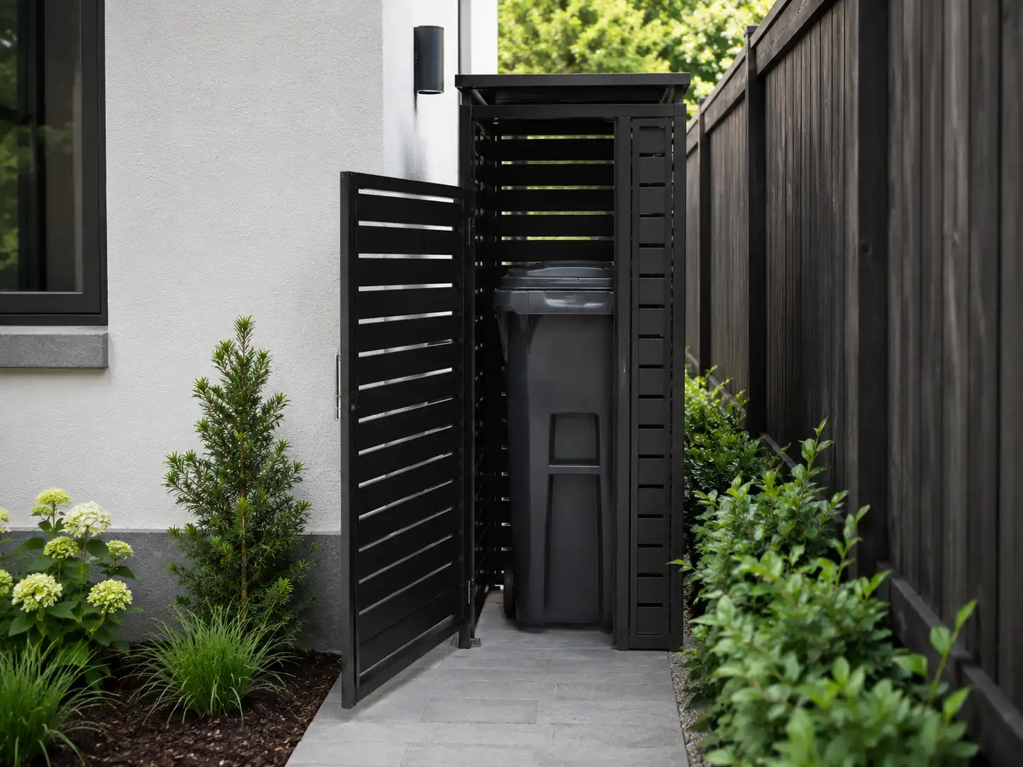 Slim single-bin enclosure designed to hide a trash can in a narrow side yard